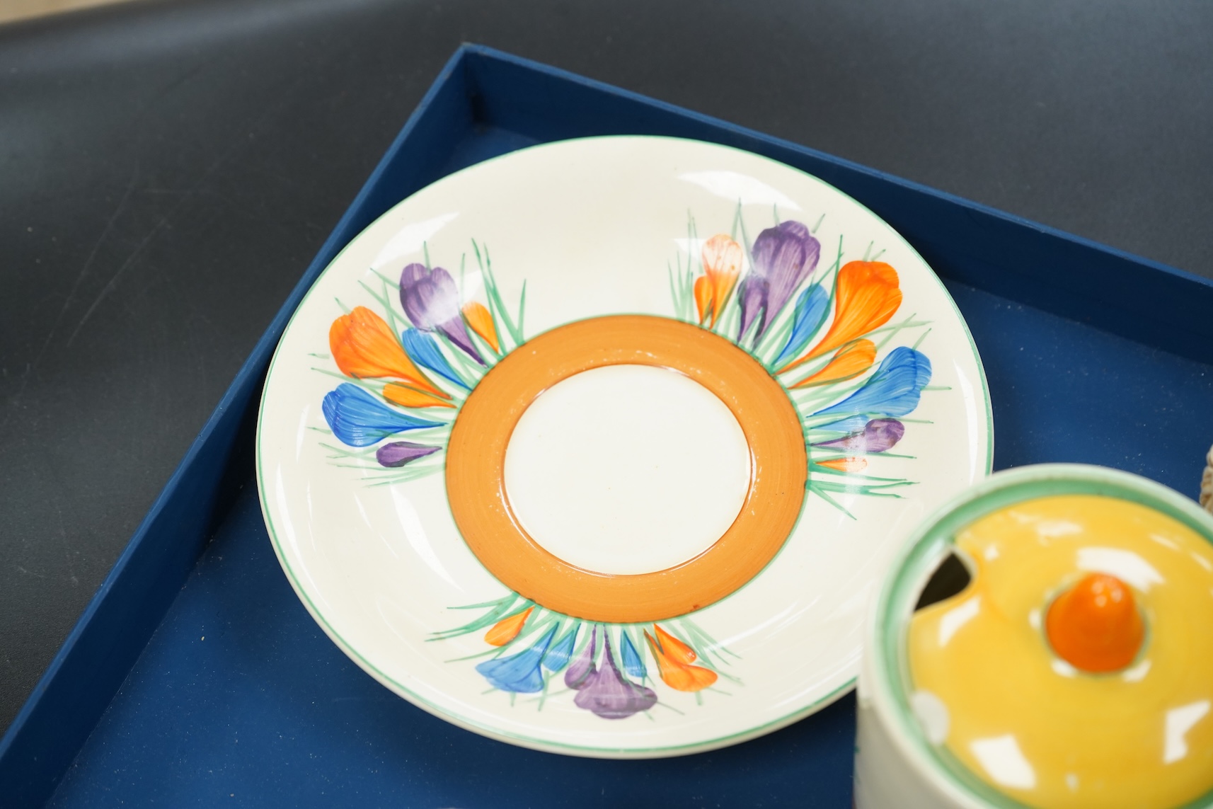 A collection of mixed porcelain and pottery to include four Worcester vases, one signed H. Blake, Clarice Cliff crocus pattern cup, saucer and sugar bowl and two Doulton Imari paperweights, largest 13cm high